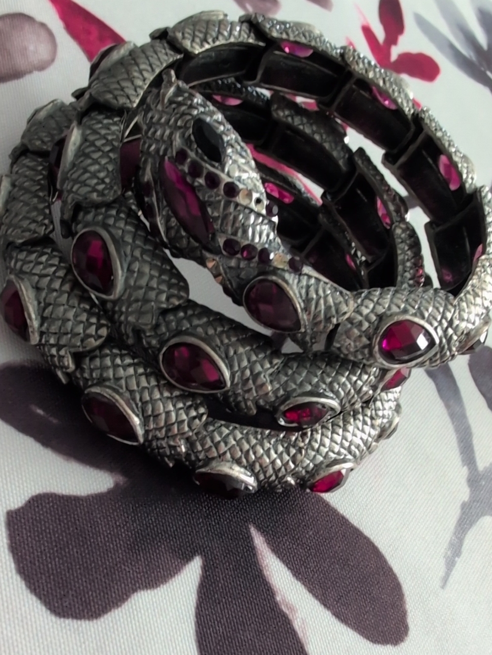 Silver-Tone Serpent Coil Bracelet with Deep Pink Gem Accents
